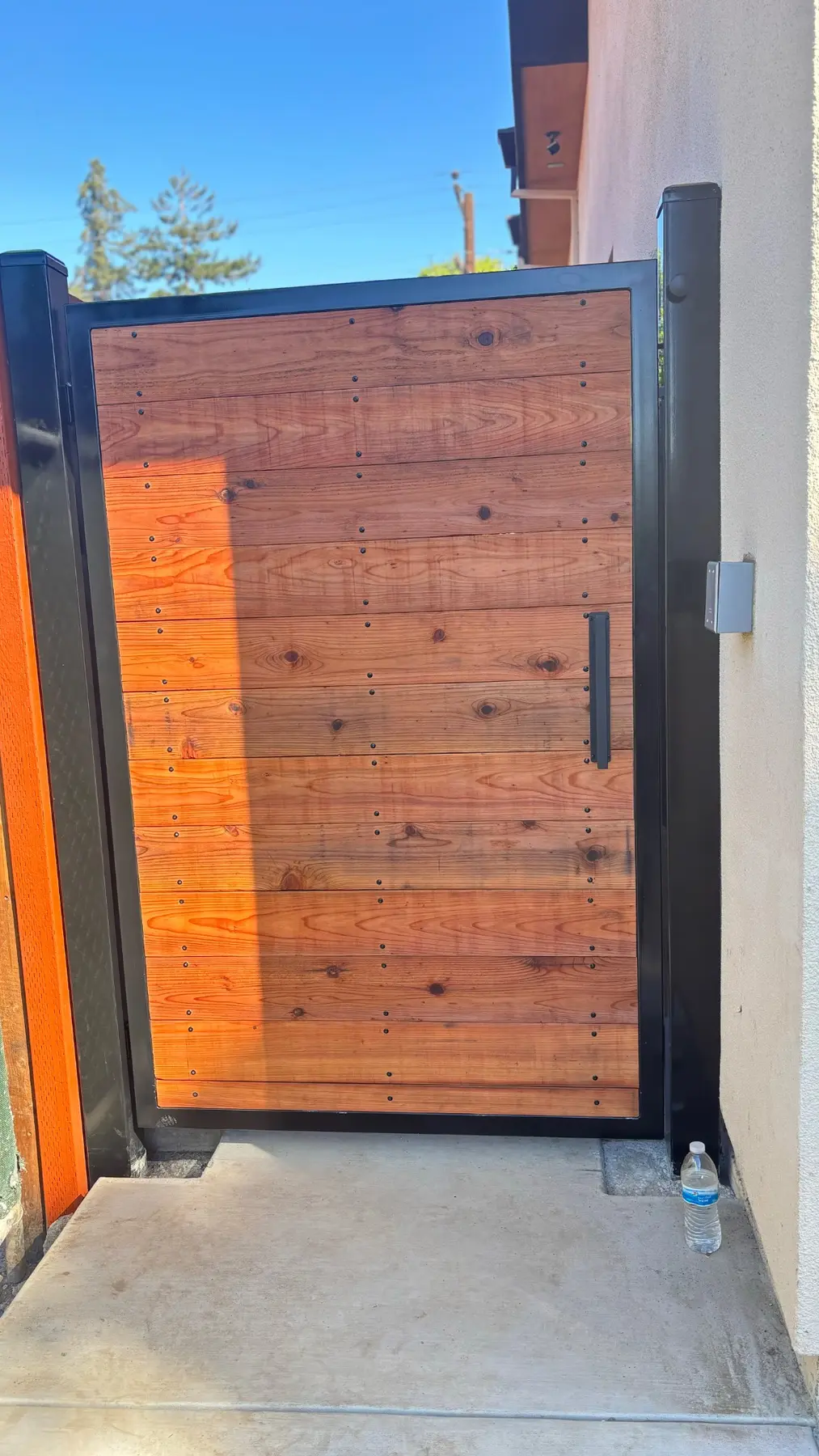 Modern custom wood gate installation completed by Garescape in Sunnyvale, California